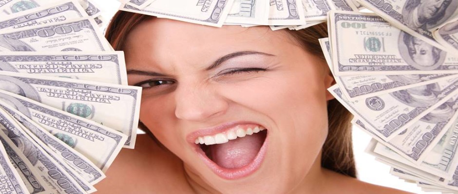 Pretty lady holding cash